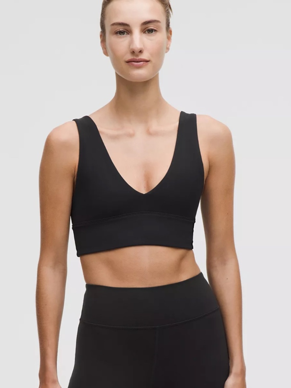 Lululemon Black Bra in size 4 with built in pads.